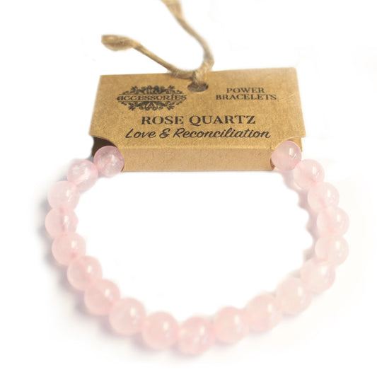Pulsera brazalete de piedras rosas de cuarzo rosa con etiqueta de cartón para colgar en expositor