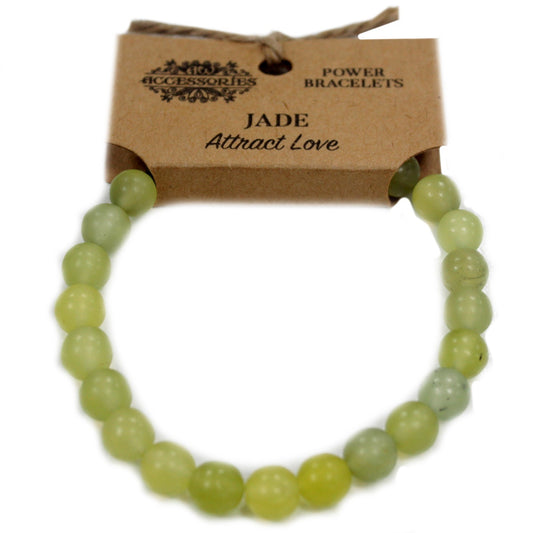 Pulsera brazalete piedras verdosas de jade con etiqueta de cartón para colgar en expositor